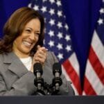 Kamala Harris celebrating, US flag