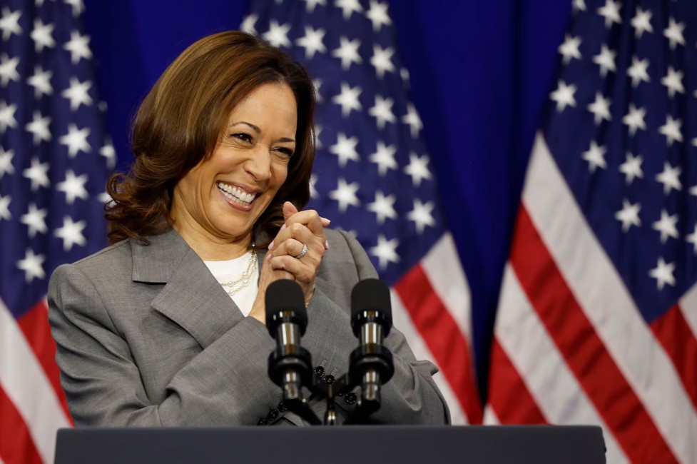 Kamala Harris celebrating, US flag