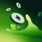 Hand holding Ehereum sign